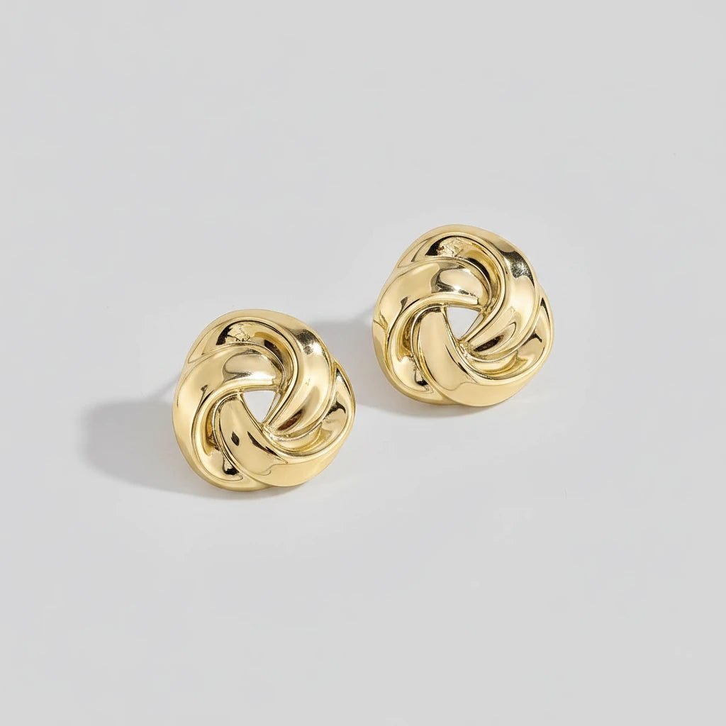 Boucles d'Oreilles Géométriques Torsadées – Dorées | Style Moderne & Original