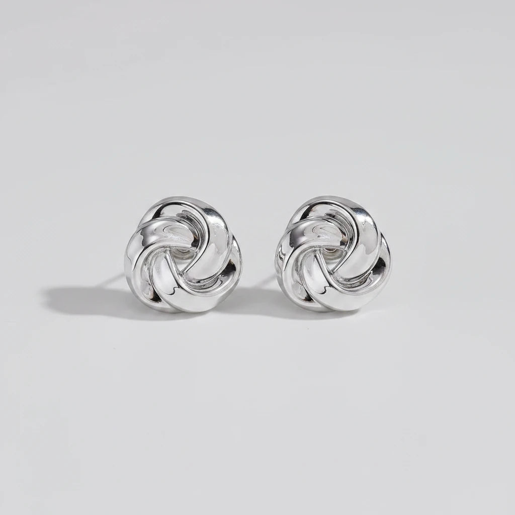 Boucles d'Oreilles Géométriques Torsadées – Dorées | Style Moderne & Original