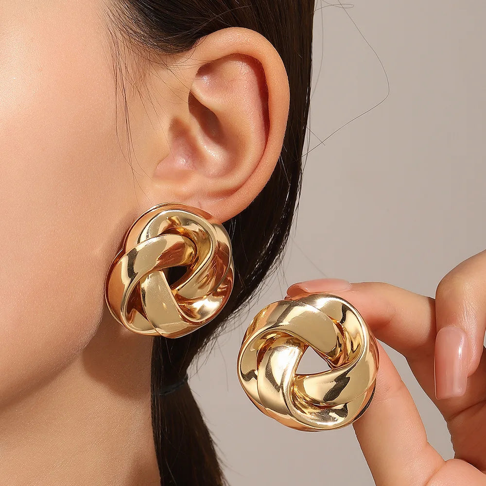 Boucles d'Oreilles Géométriques Torsadées – Dorées | Style Moderne & Original