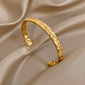 Bracelet Jonc Soleil Lune – Acier Doré | Style Vintage & Ethnique